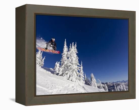 Snowboarding Action at Whitefish Mountain Resort in Whitefish, Montana, USA-Chuck Haney-Framed Premier Image Canvas