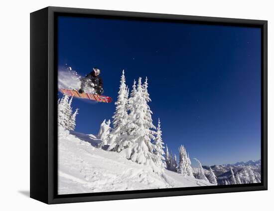 Snowboarding Action at Whitefish Mountain Resort in Whitefish, Montana, USA-Chuck Haney-Framed Premier Image Canvas