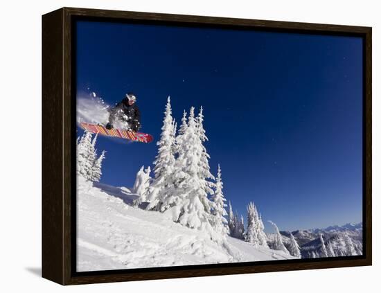 Snowboarding Action at Whitefish Mountain Resort in Whitefish, Montana, USA-Chuck Haney-Framed Premier Image Canvas