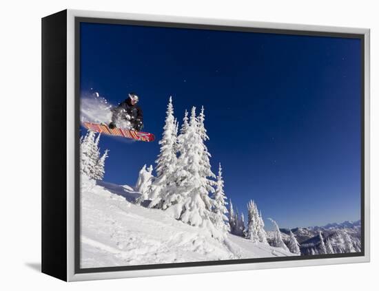 Snowboarding Action at Whitefish Mountain Resort in Whitefish, Montana, USA-Chuck Haney-Framed Premier Image Canvas