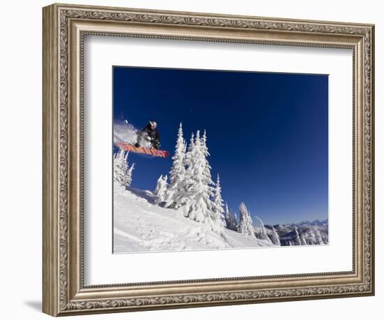 Snowboarding Action at Whitefish Mountain Resort in Whitefish, Montana, USA-Chuck Haney-Framed Photographic Print