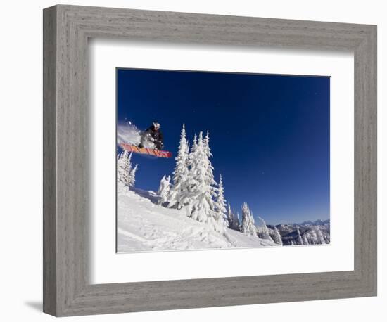 Snowboarding Action at Whitefish Mountain Resort in Whitefish, Montana, USA-Chuck Haney-Framed Photographic Print