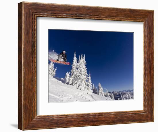 Snowboarding Action at Whitefish Mountain Resort in Whitefish, Montana, USA-Chuck Haney-Framed Photographic Print