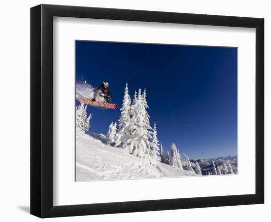 Snowboarding Action at Whitefish Mountain Resort in Whitefish, Montana, USA-Chuck Haney-Framed Photographic Print