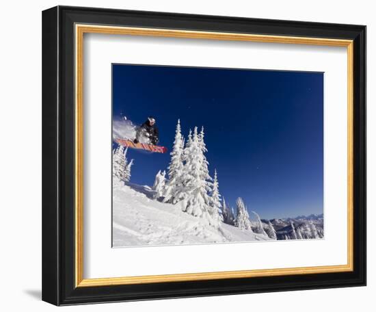 Snowboarding Action at Whitefish Mountain Resort in Whitefish, Montana, USA-Chuck Haney-Framed Photographic Print