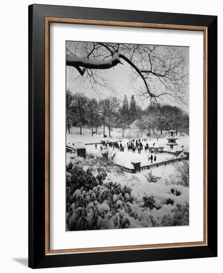 Snowing Evening Central Park, NYC-Walter Bibikow-Framed Photographic Print