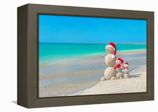 Snowmans Family at Sea Beach in Santa Hat. New Years and Christmas-EMprize-Framed Premier Image Canvas