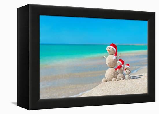 Snowmans Family at Sea Beach in Santa Hat. New Years and Christmas-EMprize-Framed Premier Image Canvas