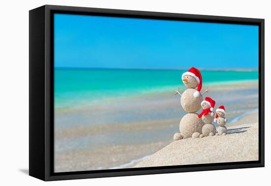 Snowmans Family at Sea Beach in Santa Hat. New Years and Christmas-EMprize-Framed Premier Image Canvas