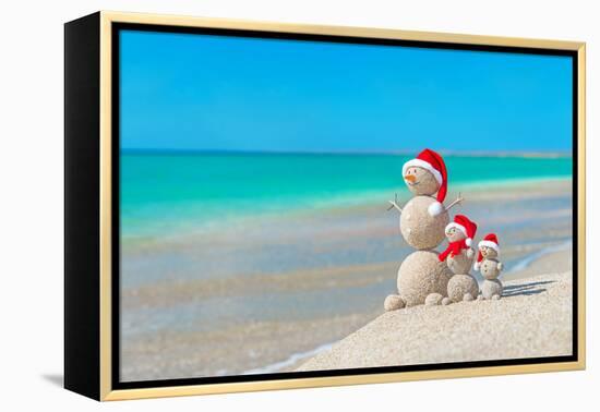 Snowmans Family at Sea Beach in Santa Hat. New Years and Christmas-EMprize-Framed Premier Image Canvas