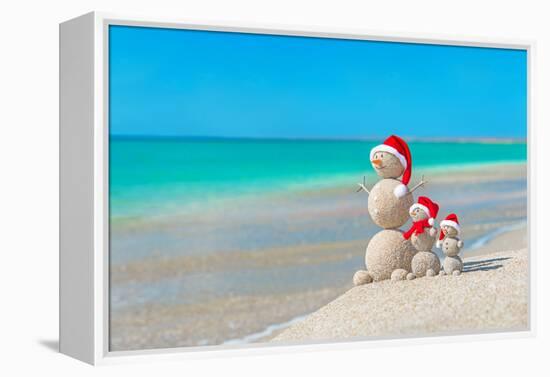 Snowmans Family at Sea Beach in Santa Hat. New Years and Christmas-EMprize-Framed Premier Image Canvas