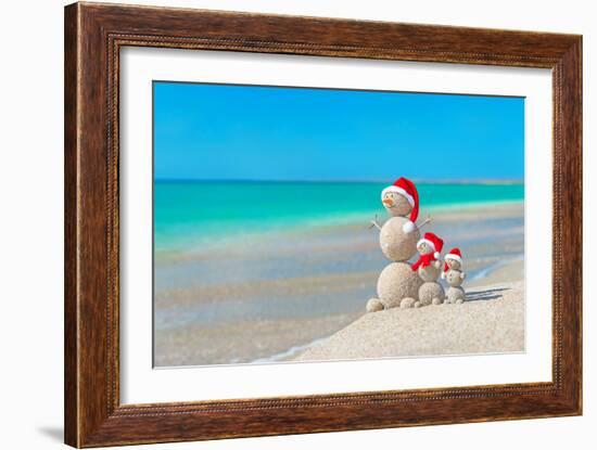 Snowmans Family at Sea Beach in Santa Hat. New Years and Christmas-EMprize-Framed Photographic Print