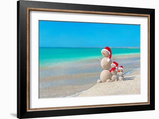 Snowmans Family at Sea Beach in Santa Hat. New Years and Christmas-EMprize-Framed Photographic Print