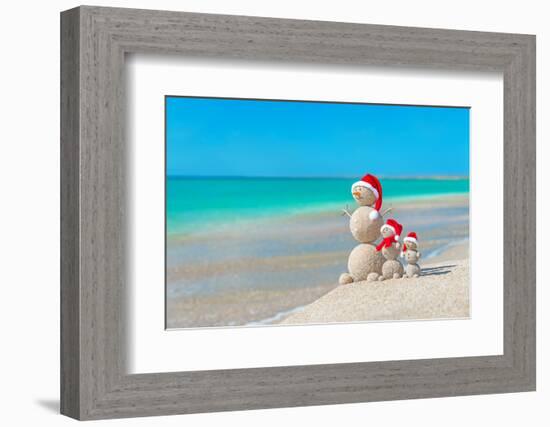 Snowmans Family at Sea Beach in Santa Hat. New Years and Christmas-EMprize-Framed Photographic Print