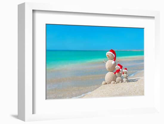 Snowmans Family at Sea Beach in Santa Hat. New Years and Christmas-EMprize-Framed Photographic Print