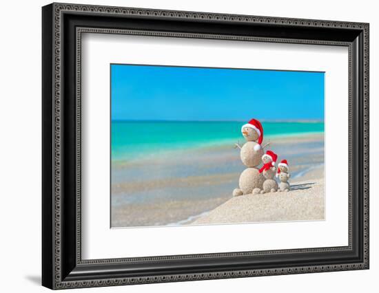 Snowmans Family at Sea Beach in Santa Hat. New Years and Christmas-EMprize-Framed Photographic Print