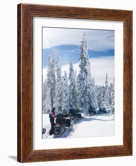 Snowmobilers in a Hoar Frosted Forest on Two Top Mountain, West Yellowstone, Montana, United States-Kimberly Walker-Framed Photographic Print