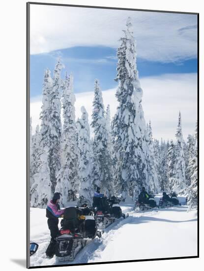 Snowmobilers in a Hoar Frosted Forest on Two Top Mountain, West Yellowstone, Montana, United States-Kimberly Walker-Mounted Photographic Print