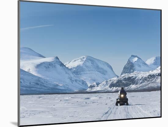 Snowmobiling in Kalix River Valley With Snow Covered Mountains, Kiruna Region, Arctic Sweden-Kim Walker-Mounted Photographic Print