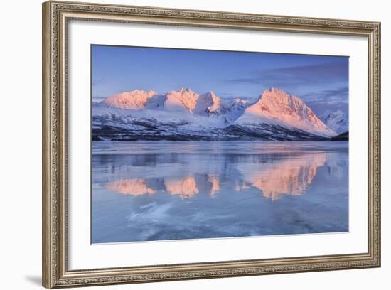 Snowy Peaks are Reflected in the Frozen Lake Jaegervatnet at Sunset, Lapland-Roberto Moiola-Framed Photographic Print