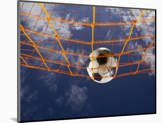 Soccer Ball Going Into Goal Net-Randy Faris-Mounted Photographic Print