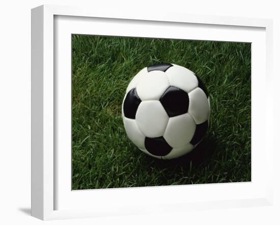 Soccer Ball in Grass-null-Framed Photographic Print