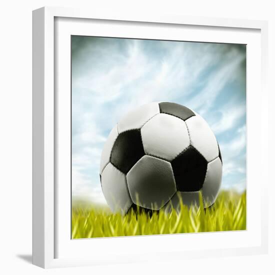 Soccer Ball Resting on Grass-null-Framed Photographic Print