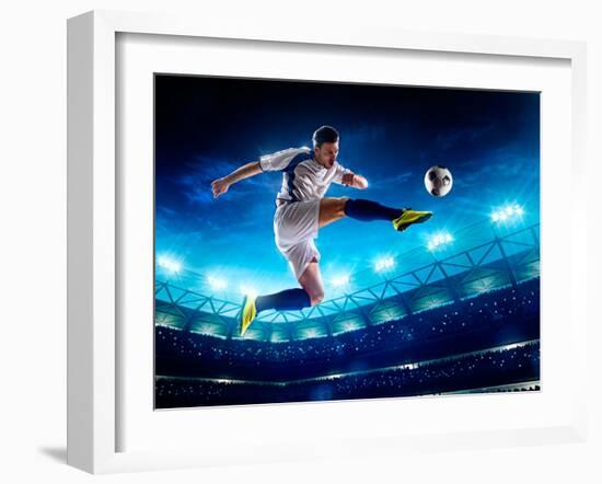 Soccer Player in Action on Night Stadium Background-Eugene Onischenko-Framed Photographic Print