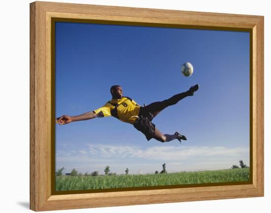 Soccer Player in Action-null-Framed Premier Image Canvas