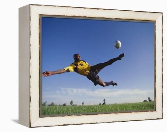 Soccer Player in Action-null-Framed Premier Image Canvas