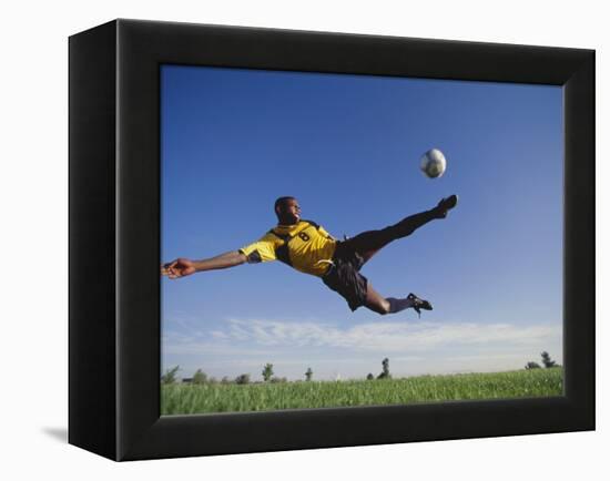 Soccer Player in Action-null-Framed Premier Image Canvas