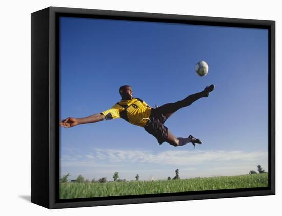 Soccer Player in Action-null-Framed Premier Image Canvas