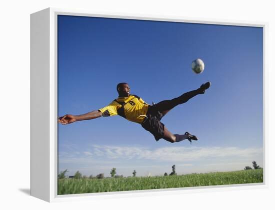 Soccer Player in Action-null-Framed Premier Image Canvas