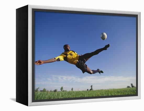 Soccer Player in Action-null-Framed Premier Image Canvas