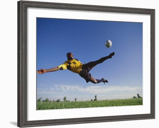 Soccer Player in Action-null-Framed Photographic Print