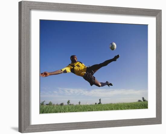 Soccer Player in Action-null-Framed Photographic Print