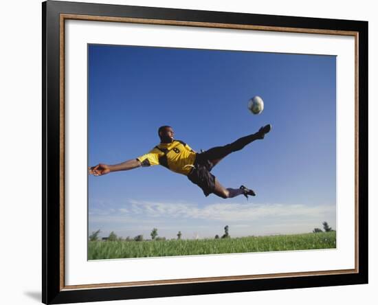 Soccer Player in Action-null-Framed Photographic Print