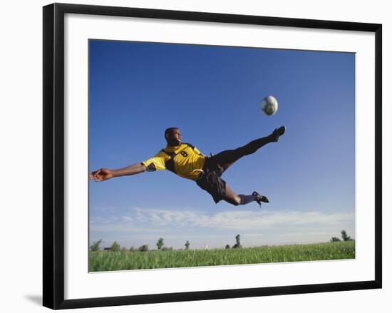 Soccer Player in Action-null-Framed Photographic Print