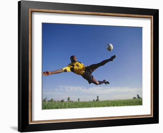 Soccer Player in Action-null-Framed Photographic Print