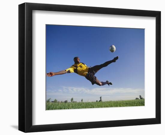 Soccer Player in Action-null-Framed Photographic Print