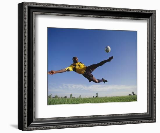 Soccer Player in Action-null-Framed Photographic Print