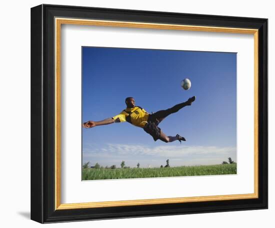 Soccer Player in Action-null-Framed Photographic Print