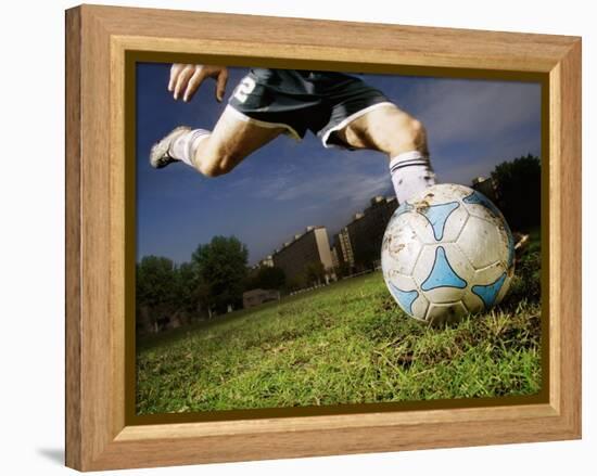 Soccer Player Kicking Ball-Randy Faris-Framed Premier Image Canvas