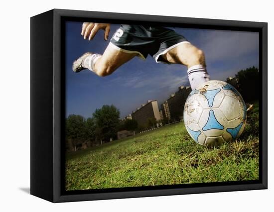 Soccer Player Kicking Ball-Randy Faris-Framed Premier Image Canvas