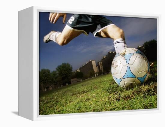 Soccer Player Kicking Ball-Randy Faris-Framed Premier Image Canvas