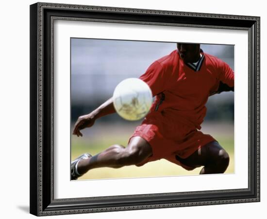 Soccer Player Preparing to Kick Ball-null-Framed Photographic Print