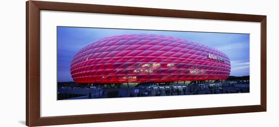 Soccer Stadium Lit Up at Dusk, Allianz Arena, Munich, Germany-null-Framed Photographic Print