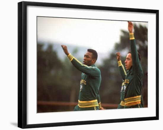 Soccer Star Pele and Teammates Loosen Up before a Practice Prior to World Cup Competition-null-Framed Premium Photographic Print