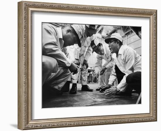 Soichiro Honda Showing Engineers Solution to Body Noise Problem at Research Facility, Japan, 1967-Takeyoshi Tanuma-Framed Photographic Print