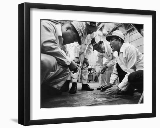 Soichiro Honda Showing Engineers Solution to Body Noise Problem at Research Facility, Japan, 1967-Takeyoshi Tanuma-Framed Photographic Print